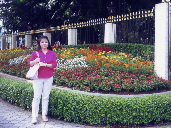Mariel with flowers in Malaysia